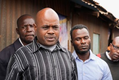 A man lies in a Kenya morgue. His family says he's one of at least 35 shot dead by police this month