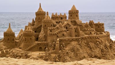 How do sandcastles stay together?