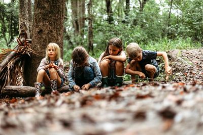 Behind the bush learning boom: why getting dirty and lighting fires is good for Australian children