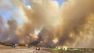 Greek authorities evacuate thousands as fires scorch island of Rhodes