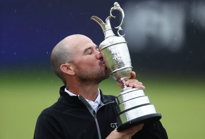 Brian Harman clinches Open glory at drenched Hoylake behind putting wizardry