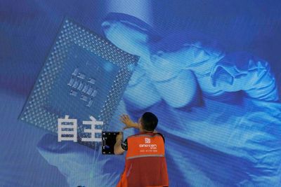 China urges Japan not to disrupt chip industry after technology curbs take effect