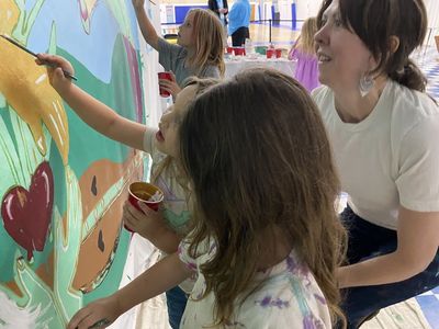 Floyd County children paint a special mural one year after surviving EKY flood