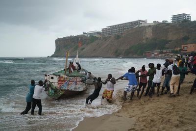 At least 17 bodies have been recovered after a migrant boat capsized off Senegal's capital city