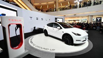 Tesla Analyst Downgrades Stock to Hold From Buy