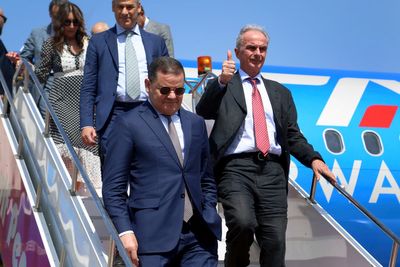 One of Libya’s rival prime ministers returns to Tripoli on 1st commercial flight from Italy in years