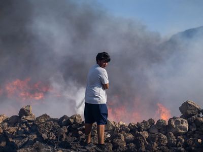 UK rescue flights for tourists fleeing ‘out of control’ wildfires on Rhodes and Corfu