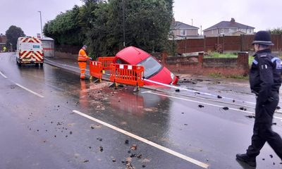 Sinkhole swallows car after water pipe bursts under Coventry street