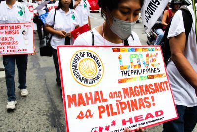 Philippines to lower bar for nurses as low pay drives many abroad