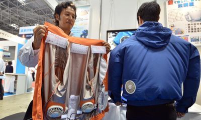 The fan jacket: the Japanese innovation keeping workers cool in extreme heat