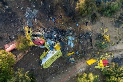 Plane fighting Greece wildfires crashes in Evia leaving two people dead