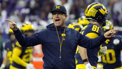 Michigan football coach Jim Harbaugh facing four-game suspension