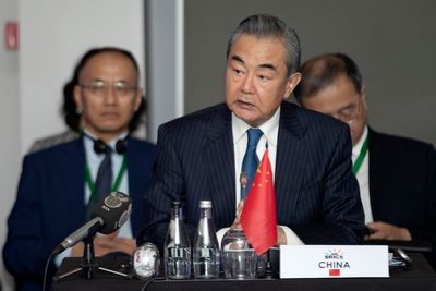 China's sharp-tongued foreign minister is ousted, but his combative style is expected to continue