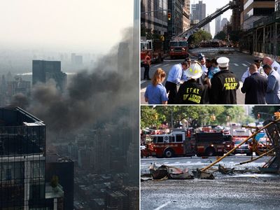 New York City crane collapse – live: Six injured after crane catches fire and collapses on Manhattan high-rise