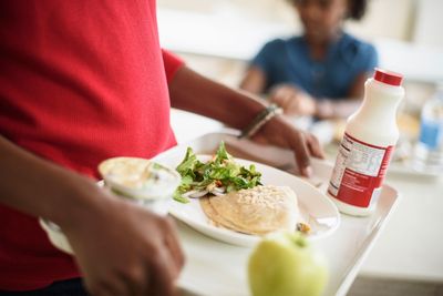 How do corporations impact school lunch?