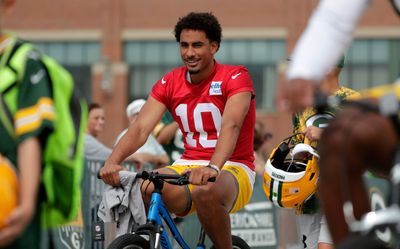 Jordan Love led the Packers’ adorable tradition of riding kids’ bikes to training camp practice