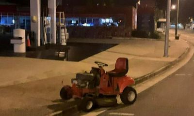 Man charged after allegedly riding lawn mower through Queensland town while drunk