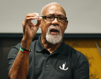 Olympian and civil rights icon John Carlos introduces Jaylen Brown at supermax signing event