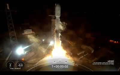 SpaceX launches 22 Starlink satellites, lands rocket at sea