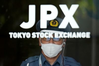 Japan's central bank retains key interest rate while fine-tuning bond purchases for more flexibility