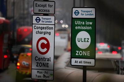 A pollution tax on older cars can be extended to London's suburbs after a British court ruling