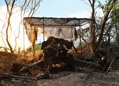 Ukraine’s troops advance around Bakhmut despite intense artillery fire from Russia’s forces, military say