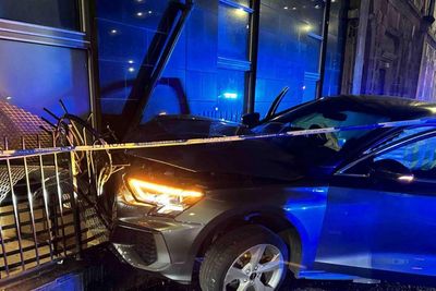 Man charged after 'speeding' car crashes into building following police pursuit