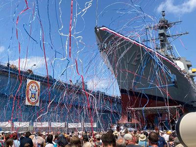 Medal of Honor recipient watches as warship bearing his name is christened in Maine