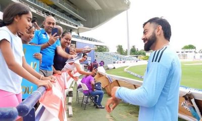 Virat Kohli makes fans' day in Bridgetown with autographs; receives bracelet from young fan