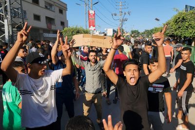 Thousands take to streets in Gaza in rare public display of discontent with Hamas