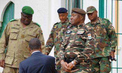 Niger coup leaders warn against military intervention as west African leaders set to meet