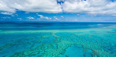 Out of danger because the UN said so? Hardly – the Barrier Reef is still in hot water