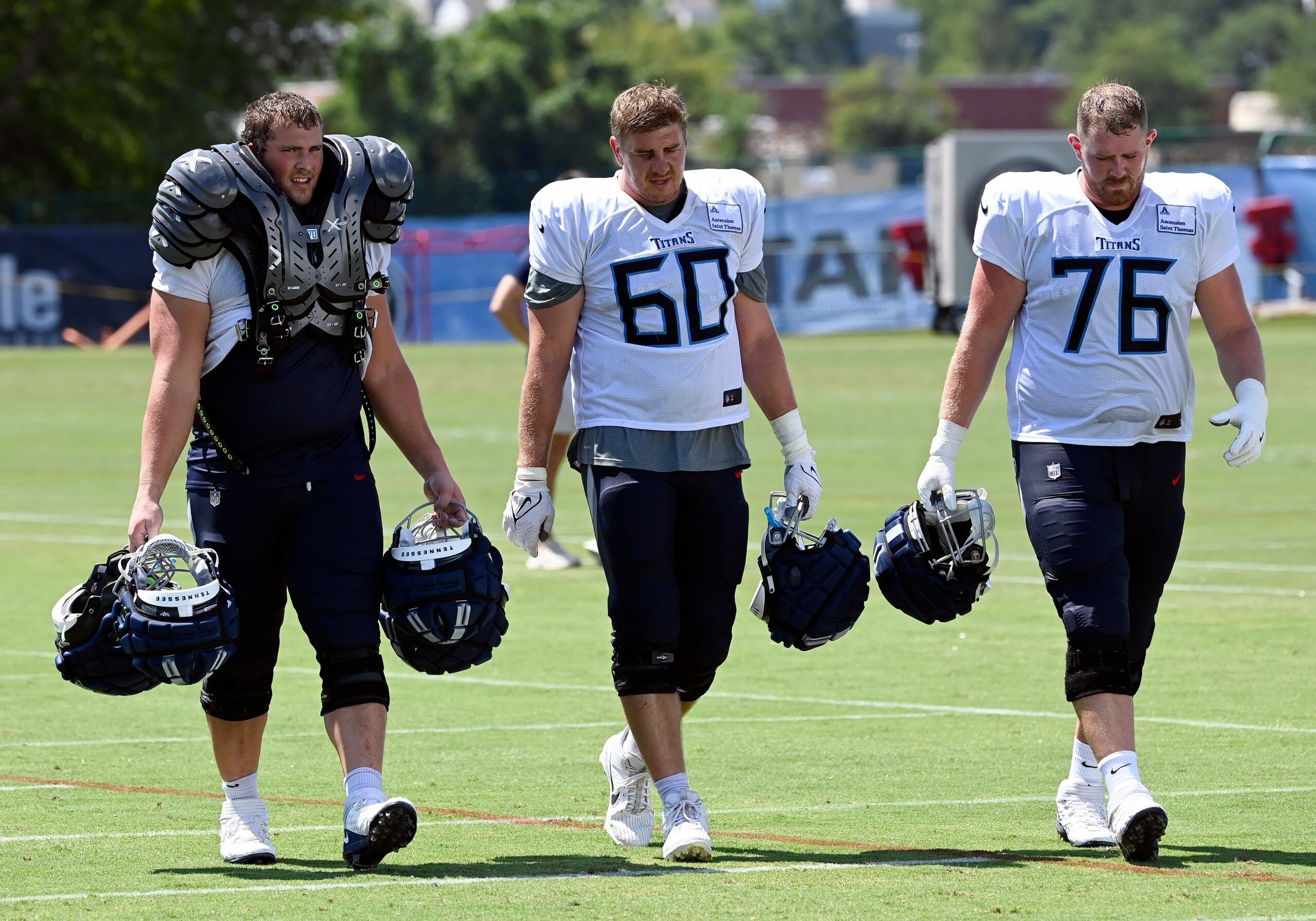 Photos from Titans' first padded practice of training…