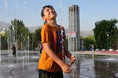 Iran will close government offices, banks and schools for 2 days over high temperatures