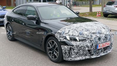 BMW i4 Facelift Spied With Camo That Can’t Hide New Headlight Design