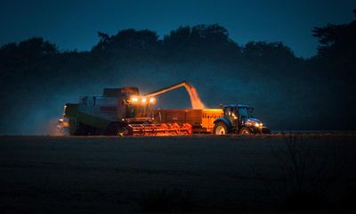 Country diary: The combine harvester is an awesome sight at night