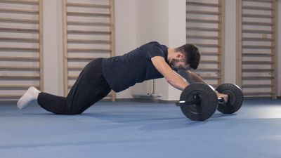 Barbell ab rollouts: How to do them and the benefits for strengthening your core muscles