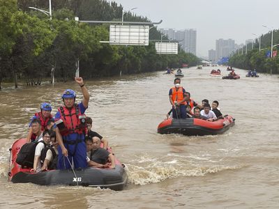 China floods have left at least 20 dead