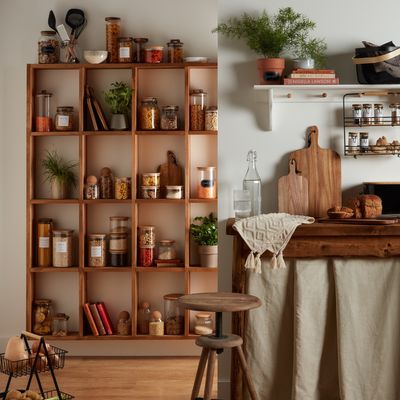 The secrets professional organisers use to make a pantry look expensive