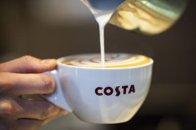 Britain’s largest coffee chain is facing boycott over its illustration of a transgender person
