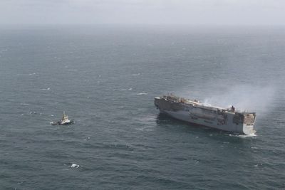 A car-carrying ship that burned for a week on the North Sea will be towed to a Dutch port