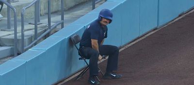 Dodgers security guard makes the most athletic move with his chair to avoid a foul ball