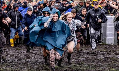Floods turn world’s biggest heavy metal festival into mudbath