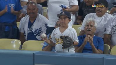 Young Dodgers Fan Has Priceless Reaction to Interfering With Live Ball