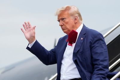 Trump arrives in court for historic arraignment on 2020 election charges