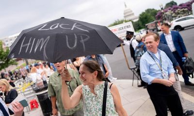 Crowds gather under stormy skies for glimpse of Trump in court – again