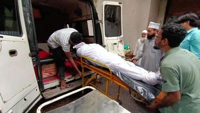 Who were the three Muslim men shot dead inside train by Indian armed guard?