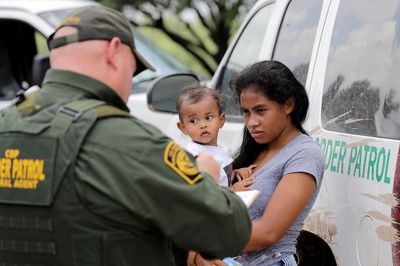 Texas separates migrant families, detaining fathers on trespassing charges in latest border move