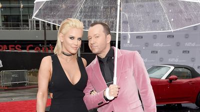 Blue Bloods’ Donnie Wahlberg Had A Red-Blooded Reaction To His Wife Jenny McCarthy’s Viral Bikini Car Wash Ad