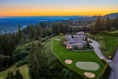 This Washington home has a private practice area with putting green, bunkers, plus a basketball court